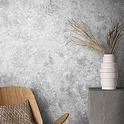 Galerie Wallcoverings Product Code 95020 - Vault Wallpaper Collection - Grey Colours - This earthy wallpaper will be a warming welcome to your home and perfect on all four walls or accompanied by a complementing design. The wallpaper has a subtle emboss that creates some structural depth and comes in a mottled grey tones that are reminiscent of parched clay soil. It’s a great way to bring your room up to date with a natural and earthy feel. Design