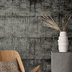 Galerie Wallcoverings Product Code 95025 - Air Wallpaper Collection - Black Colours - This aged concrete effect wallpaper is the perfect choice if you want to bring a room up to date in a dramatic way. With a subtle emboss to create some structural depth, it comes in an on-trend black and silver colourway. Drawing on the textures of, and resembling the stippled texture of ancient plasterwork or faded limestone, this unusual wallpaper will be a warming welcome to your home. This will be perfect on all four walls or can be accompanied by a complementary wallpaper. Design